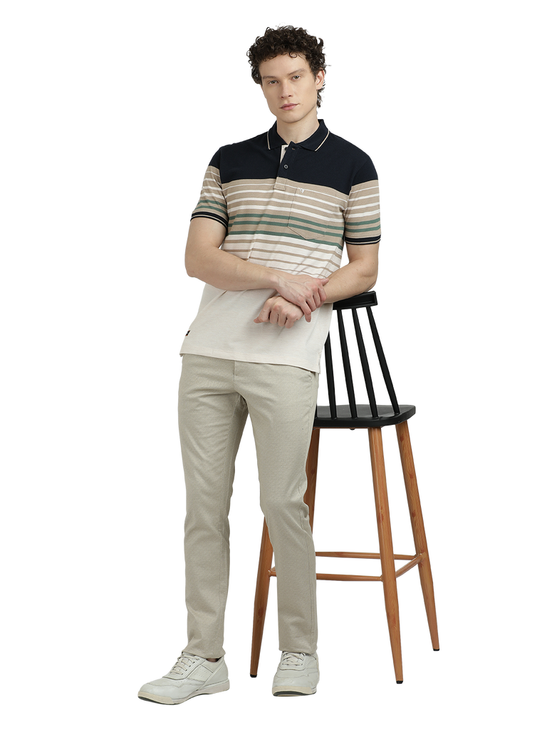 Model wearing Clarke Gable's Off White With Black Striped Polo Collar T-Shirt in a casual setting
