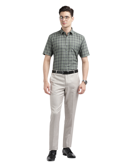 Model wearing Clarke Gable's Olive Green Checked Formal Shirt in a casual setting