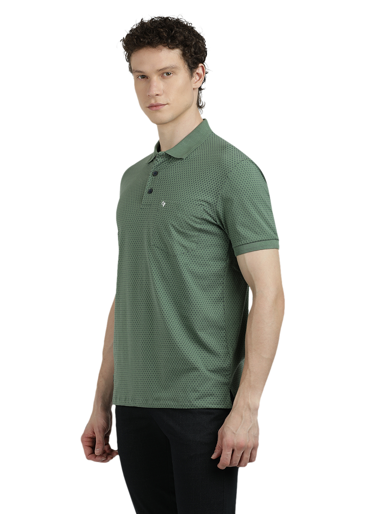 Model wearing Clarke Gable's Olive Green Printed Polo Collar T-Shirt in a casual setting