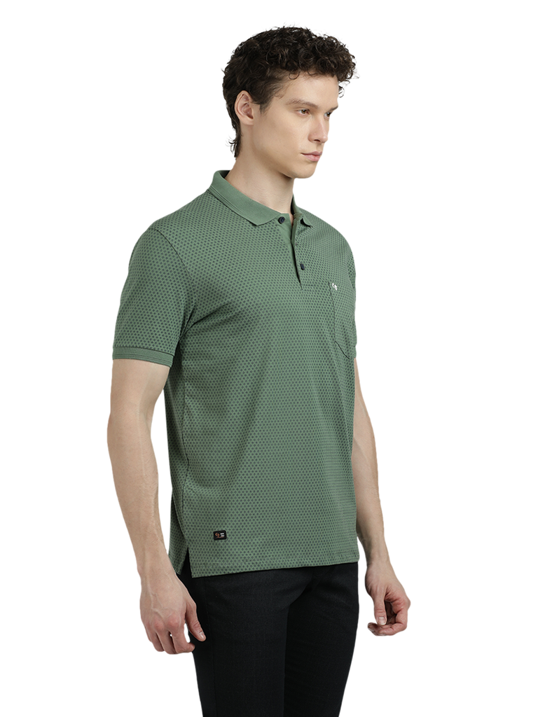 Model wearing Clarke Gable's Olive Green Printed Polo Collar T-Shirt in a casual setting