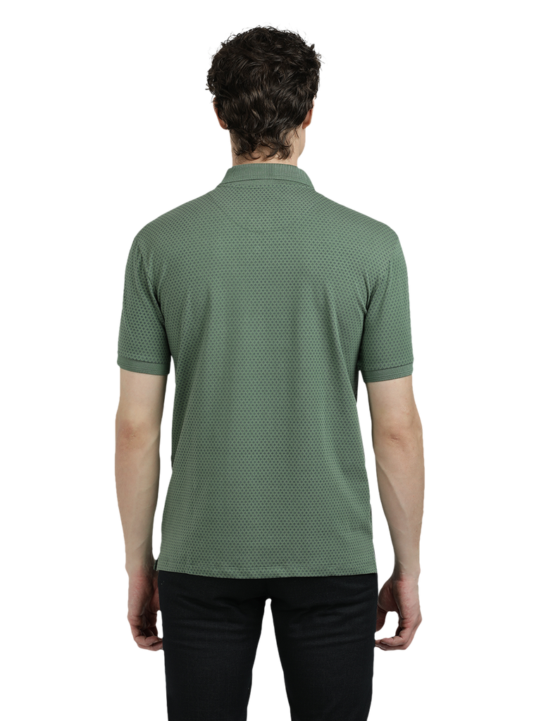 Model wearing Clarke Gable's Olive Green Printed Polo Collar T-Shirt in a casual setting