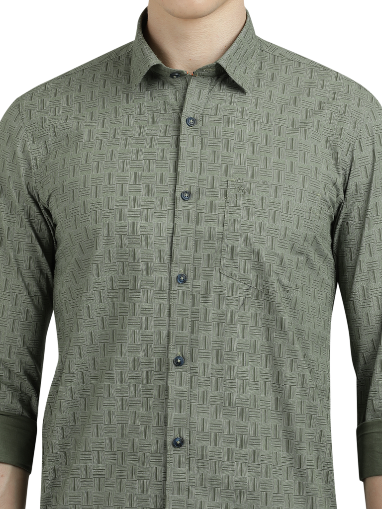 Model wearing Clarke Gable's Olive Green Printed Semi Casual Shirt in a casual setting