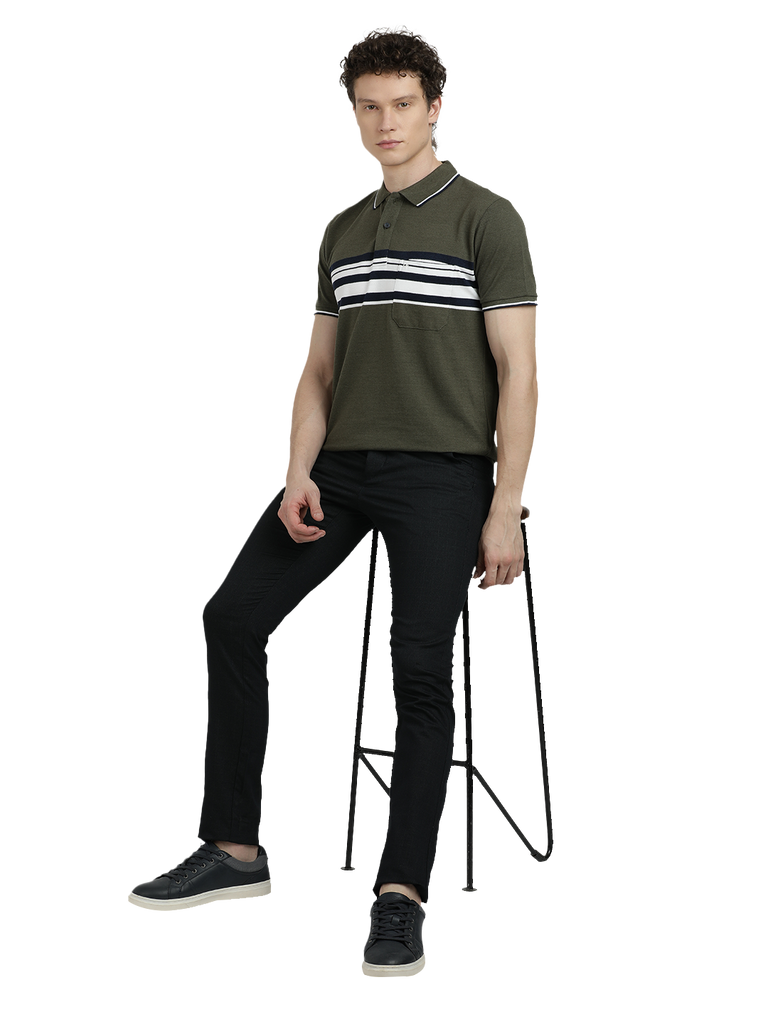 Model wearing Clarke Gable's Olive Green with White Striped Polo Collar T-Shirt in a casual setting
