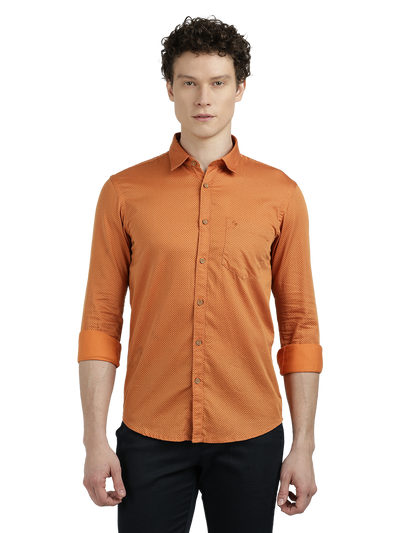 Model wearing Clarke Gable's Orange Printed Semi Casual Shirt in a casual setting