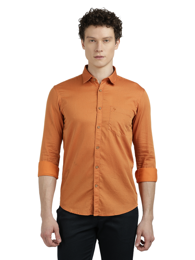 Model wearing Clarke Gable's Orange Printed Semi Casual Shirt in a casual setting