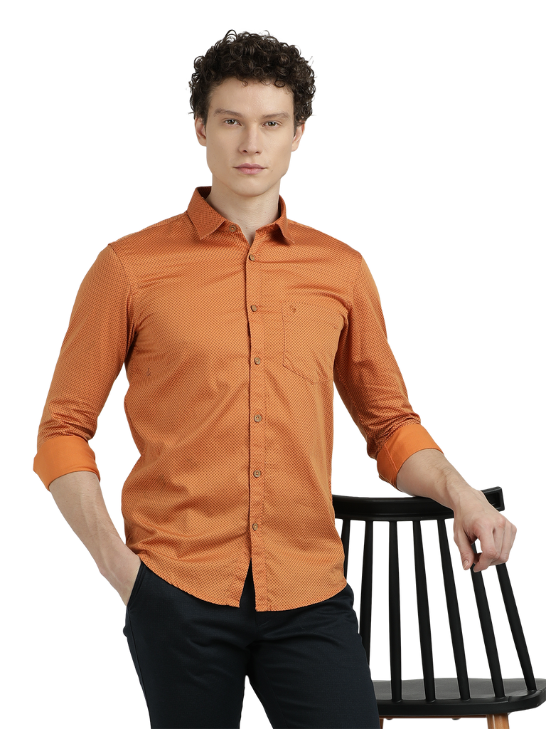 Model wearing Clarke Gable's Orange Printed Semi Casual Shirt in a casual setting