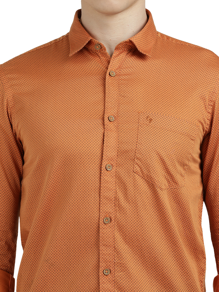 Model wearing Clarke Gable's Orange Printed Semi Casual Shirt in a casual setting