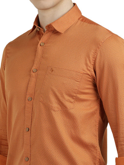 Model wearing Clarke Gable's Orange Printed Semi Casual Shirt in a casual setting