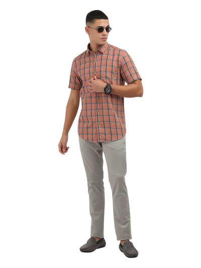 Model wearing Clarke Gable's Orange With Blue Checked Semi Casual Shirt in a casual setting