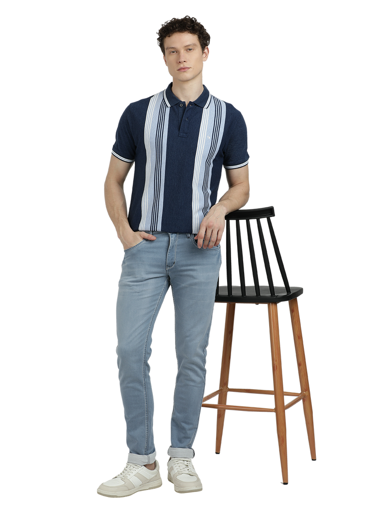 Model wearing Clarke Gable's Pastel Blue Skinny Fit Jeans in a casual setting