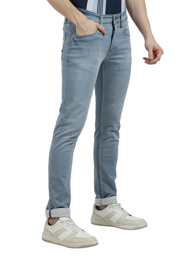 Model wearing Clarke Gable's Pastel Blue Skinny Fit Jeans in a casual setting