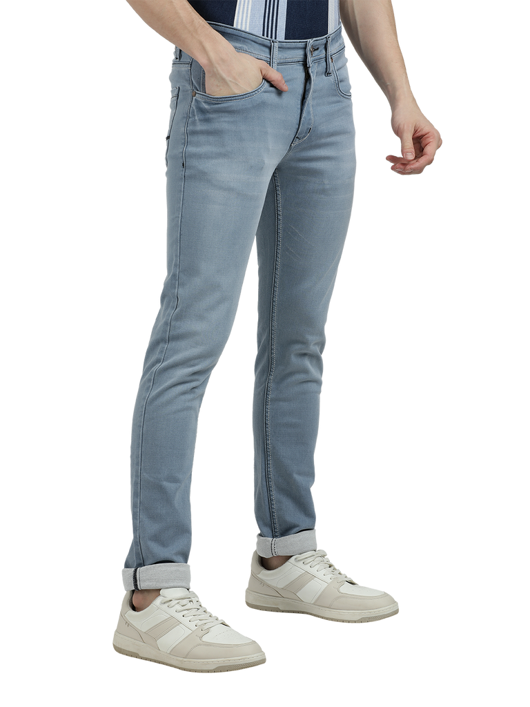 Model wearing Clarke Gable's Pastel Blue Skinny Fit Jeans in a casual setting