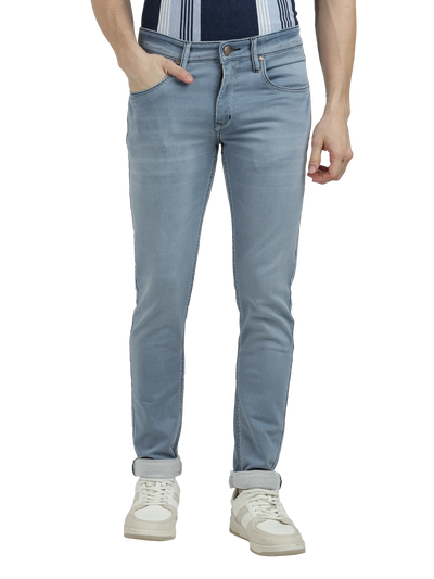 Model wearing Clarke Gable's Pastel Blue Skinny Fit Jeans in a casual setting
