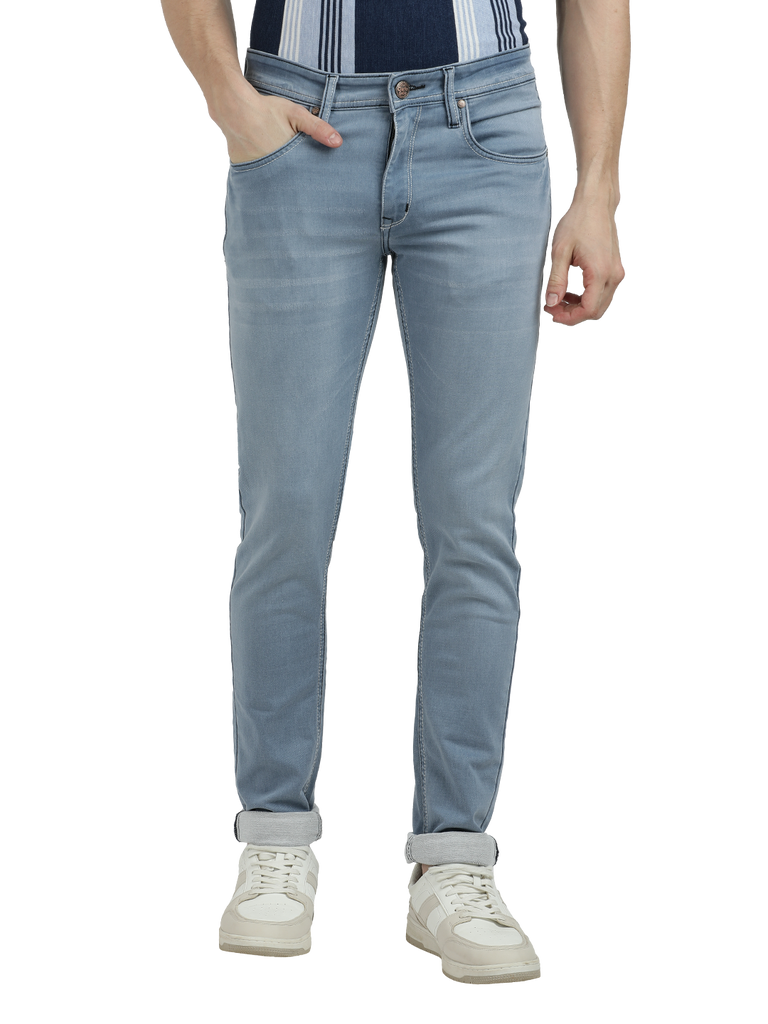 Model wearing Clarke Gable's Pastel Blue Skinny Fit Jeans in a casual setting