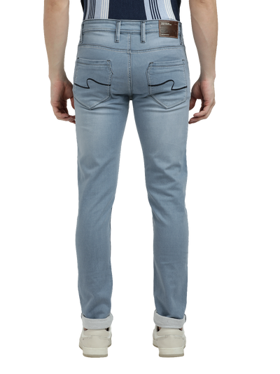 Model wearing Clarke Gable's Pastel Blue Skinny Fit Jeans in a casual setting