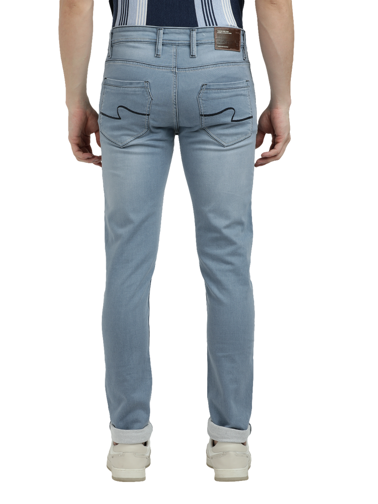 Model wearing Clarke Gable's Pastel Blue Skinny Fit Jeans in a casual setting