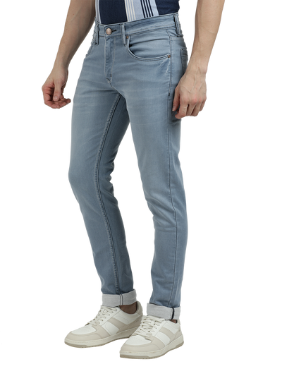 Model wearing Clarke Gable's Pastel Blue Skinny Fit Jeans in a casual setting