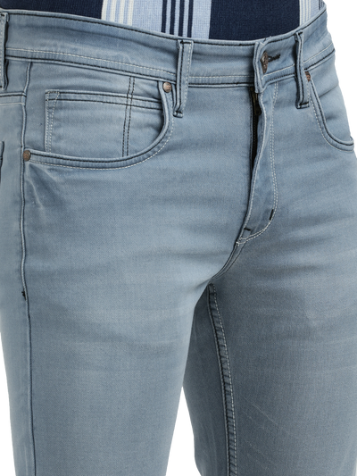 Model wearing Clarke Gable's Pastel Blue Skinny Fit Jeans in a casual setting