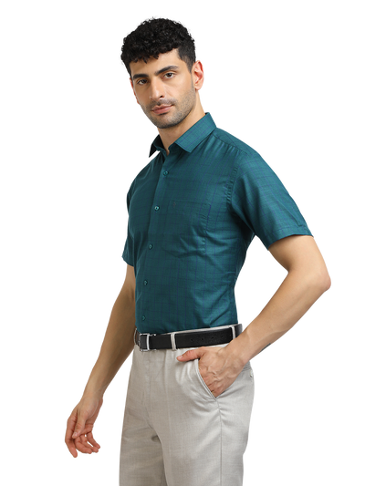 Model wearing Clarke Gable's Peacock Blue Checked Formal Shirt in a casual setting