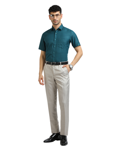 Model wearing Clarke Gable's Peacock Blue Checked Formal Shirt in a casual setting