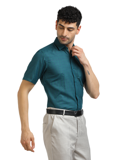 Model wearing Clarke Gable's Peacock Blue Checked Formal Shirt in a casual setting