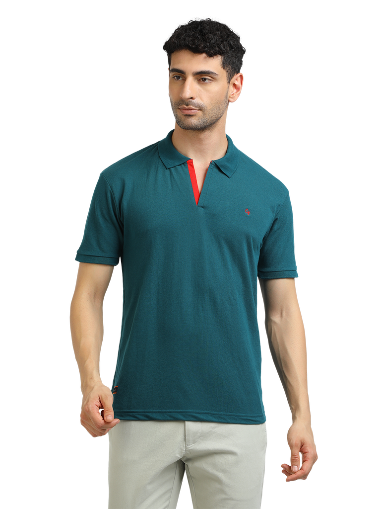 Model wearing Clarke Gable's Peacock Solid Polo Collar T-Shirt in a casual setting