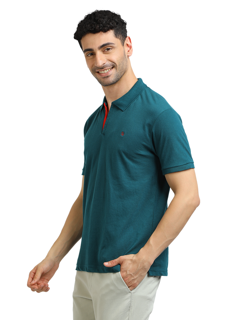 Model wearing Clarke Gable's Peacock Solid Polo Collar T-Shirt in a casual setting