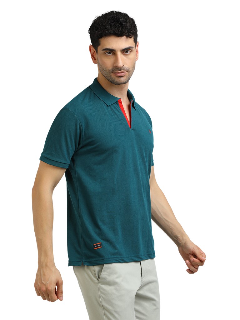 Model wearing Clarke Gable's Peacock Solid Polo Collar T-Shirt in a casual setting