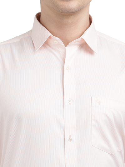 Model wearing Clarke Gable's Pink Striped Formal Shirt in a casual setting