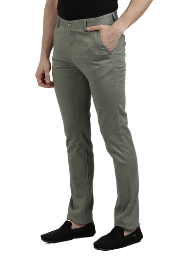 Model wearing Clarke Gable's Pista Custom Fit Trousers in a casual setting
