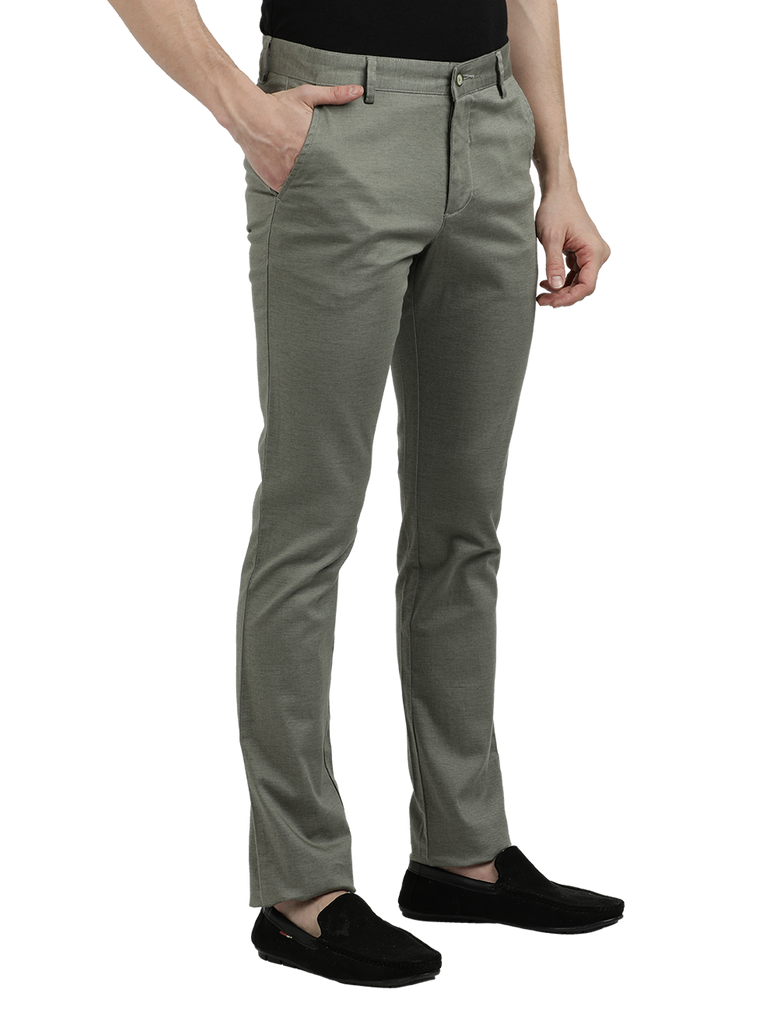 Model wearing Clarke Gable's Pista Custom Fit Trousers in a casual setting