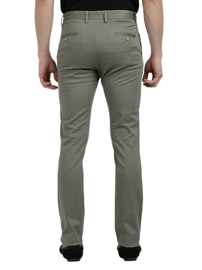 Model wearing Clarke Gable's Pista Custom Fit Trousers in a casual setting