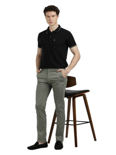 Model wearing Clarke Gable's Pista Custom Fit Trousers in a casual setting