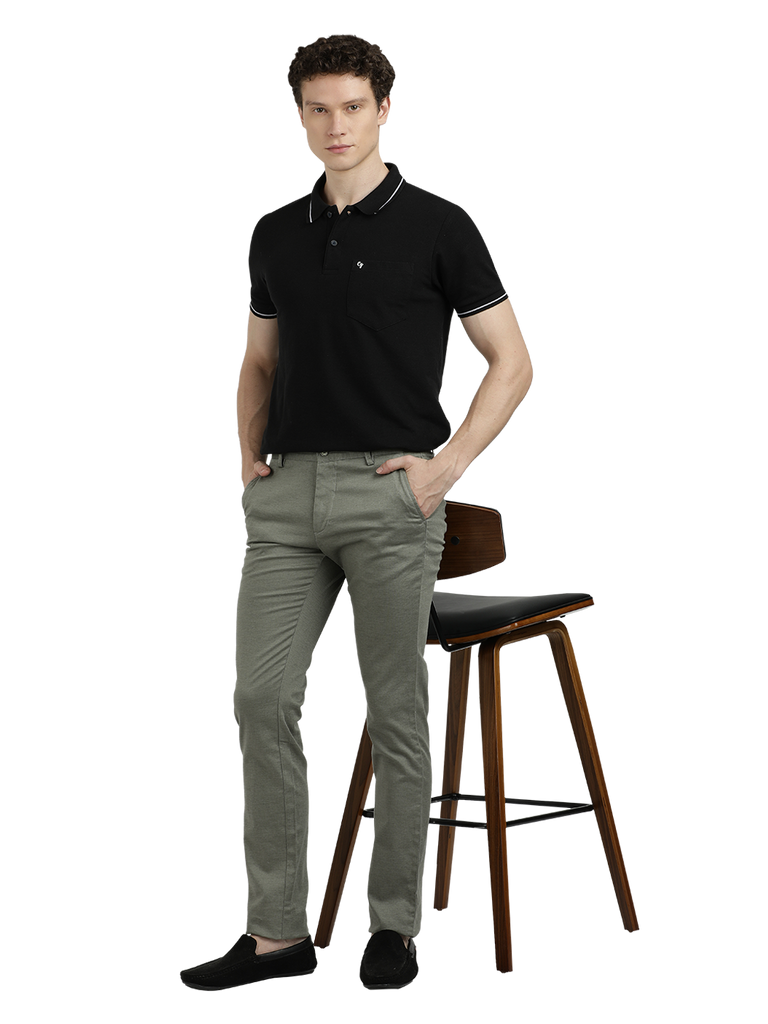 Model wearing Clarke Gable's Pista Custom Fit Trousers in a casual setting