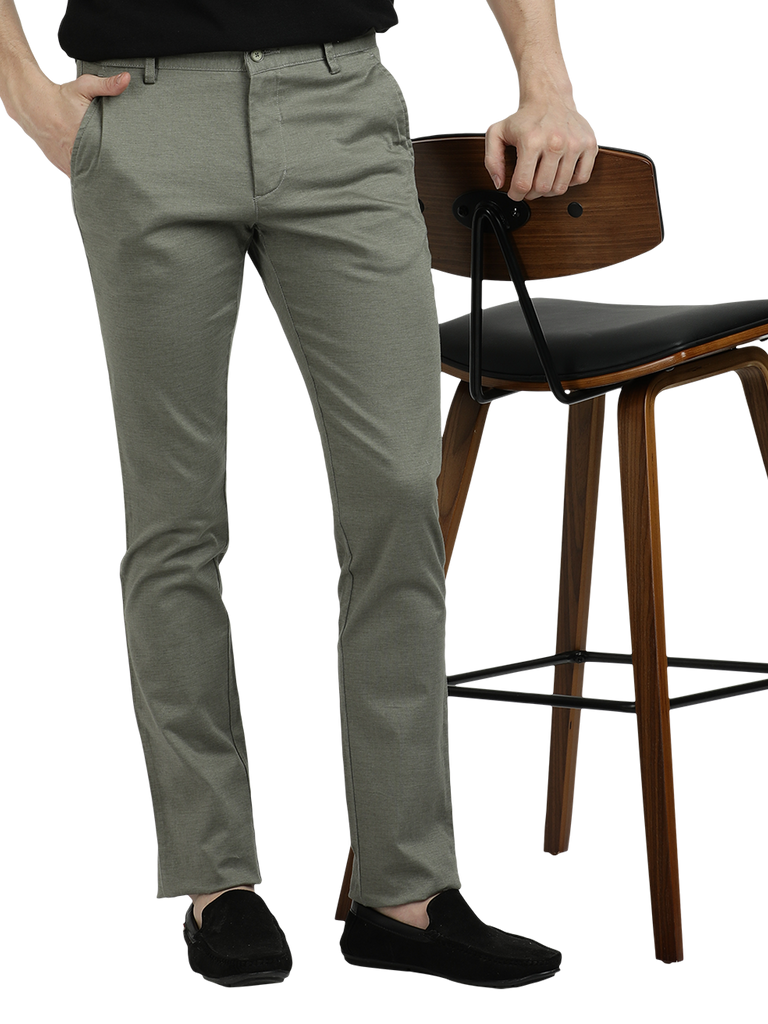 Model wearing Clarke Gable's Pista Custom Fit Trousers in a casual setting