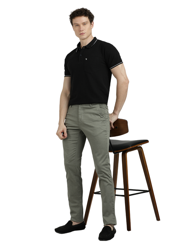 Model wearing Clarke Gable's Pista Custom Fit Trousers in a casual setting