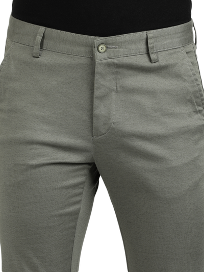 Model wearing Clarke Gable's Pista Custom Fit Trousers in a casual setting