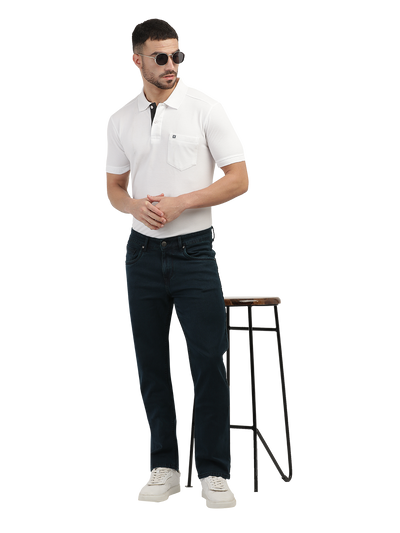 Model wearing Clarke Gable's Polor Blue Smart Fit Jeans in a casual setting