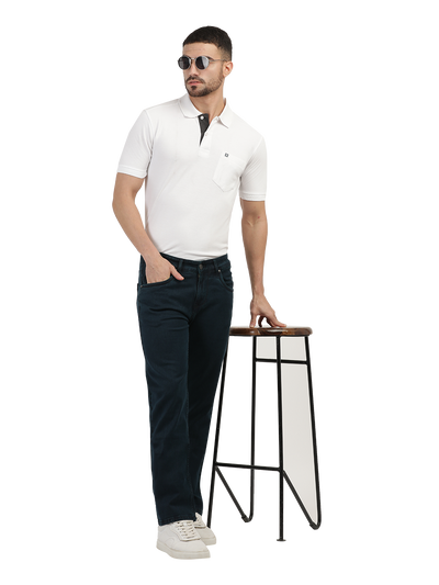 Model wearing Clarke Gable's Polor Blue Smart Fit Jeans in a casual setting