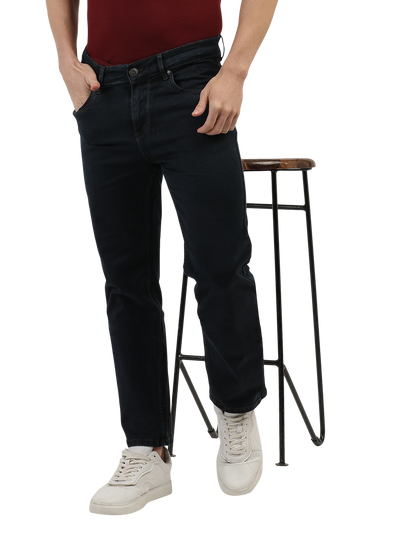 Model wearing Clarke Gable's Polor Grey Smart Fit Jeans in a casual setting