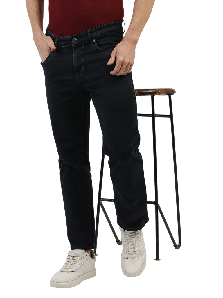 Model wearing Clarke Gable's Polor Grey Smart Fit Jeans in a casual setting