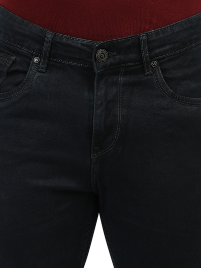 Model wearing Clarke Gable's Polor Grey Smart Fit Jeans in a casual setting