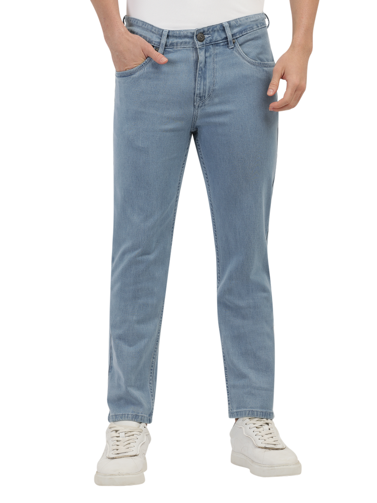 Model wearing Clarke Gable's Polor Ice Blue Smart Fit Jeans in a casual setting