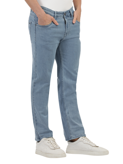 Model wearing Clarke Gable's Polor Ice Blue Smart Fit Jeans in a casual setting