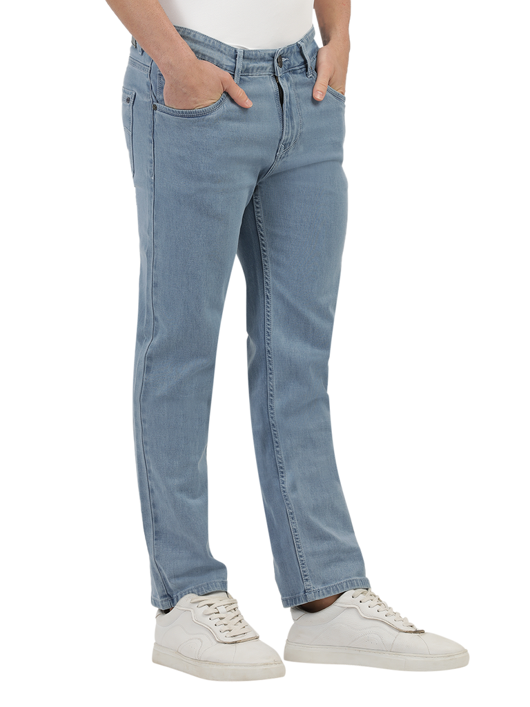 Model wearing Clarke Gable's Polor Ice Blue Smart Fit Jeans in a casual setting