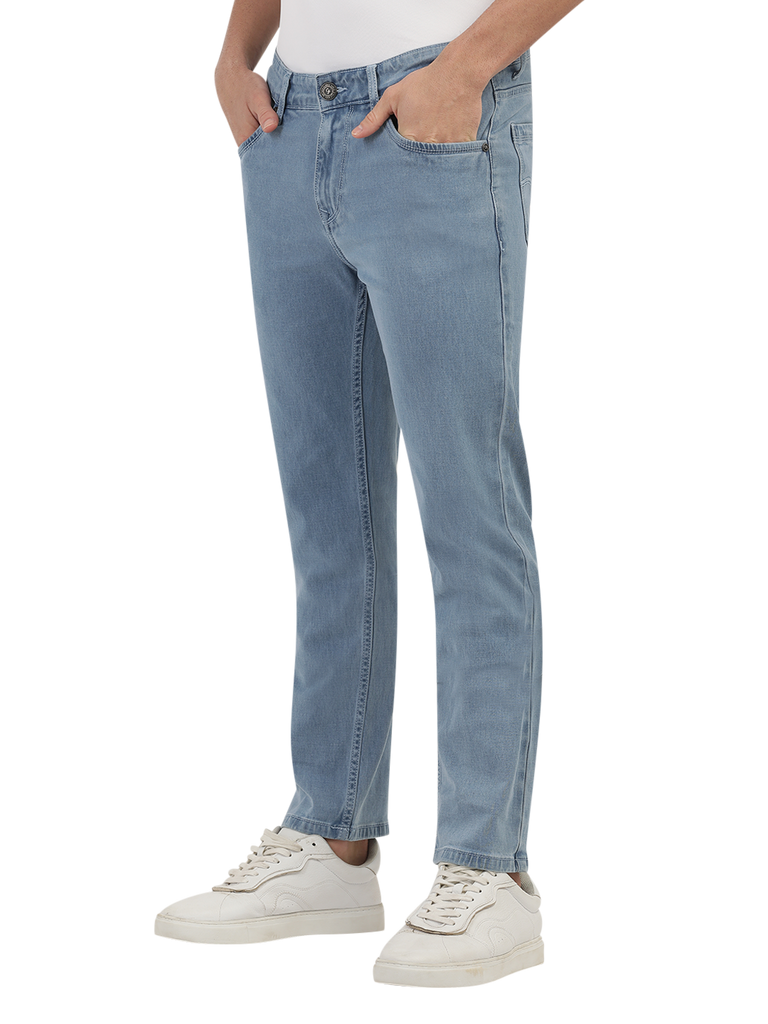 Model wearing Clarke Gable's Polor Ice Blue Smart Fit Jeans in a casual setting