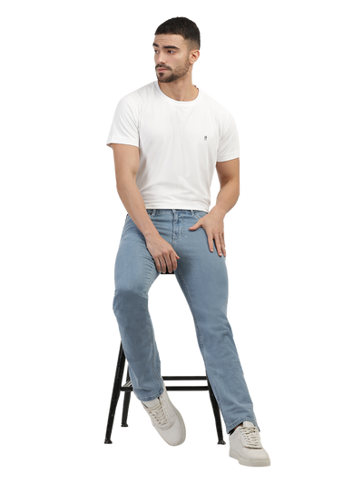 Model wearing Clarke Gable's Polor Ice Blue Smart Fit Jeans in a casual setting