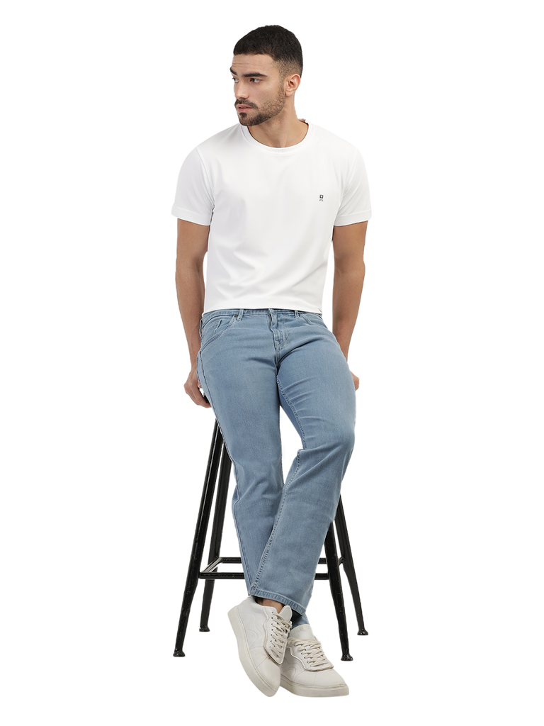 Model wearing Clarke Gable's Polor Ice Blue Smart Fit Jeans in a casual setting