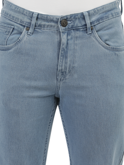 Model wearing Clarke Gable's Polor Ice Blue Smart Fit Jeans in a casual setting