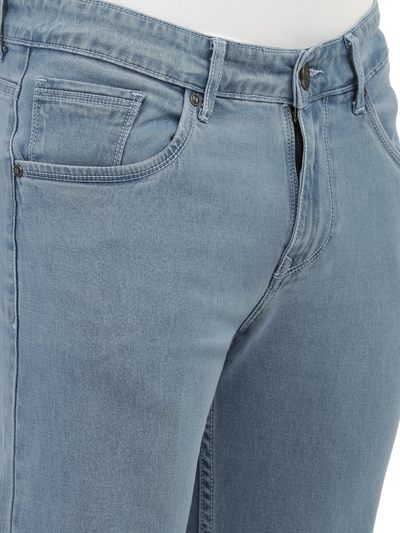 Model wearing Clarke Gable's Polor Ice Blue Smart Fit Jeans in a casual setting